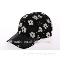 plain well designed plum flower applique black and white baseball cap ,pure color knitted brim with applique edge